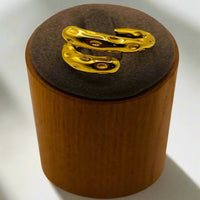 Load image into Gallery viewer, GOLD WRAP AROUND ME RING ON PODIUM
