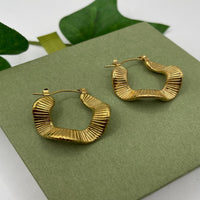Load image into Gallery viewer, Gold Wavy Earrings – Unique Flowing Design, Perfect for Everyday Elegance
